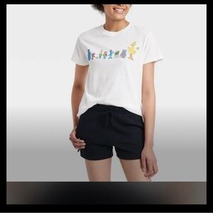 White T-Shirt with Colorful Character from Sesame Street NWT women’s medium!